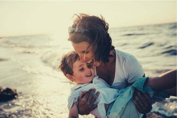 mom-and-son-happy-on-the-beach