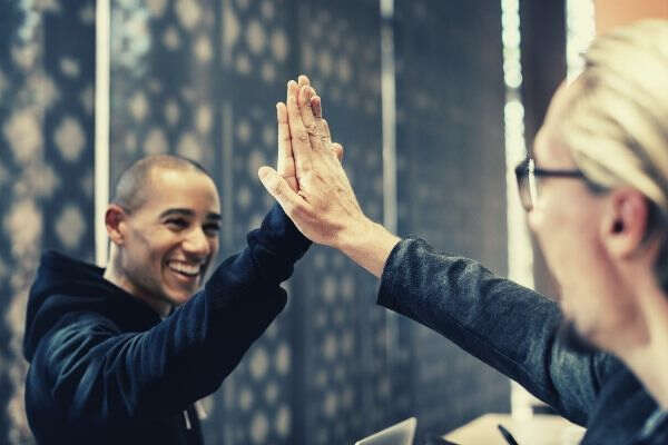 achievement-agreement-colleagues-high-five